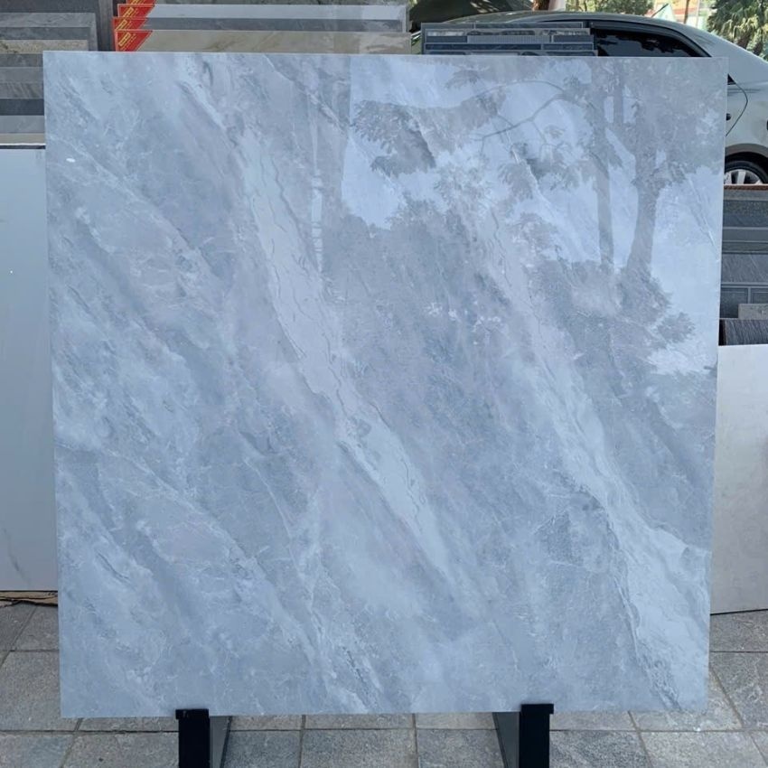 Gạch lát nền Vitto 100x100 mã 6265 men bóng vân đá màu ghi xám Gạch lát nền Vitto 100x100 mã 6265 men bóng vân đá màu ghi xám