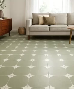 Sàn phòng khách lát gạch bông Novita OLIVE 2235, họa tiết đơn giản, màu xanh olive, ánh sáng tự nhiên.