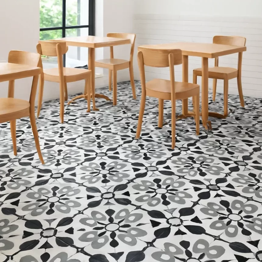 Không gian quán cafe với gạch bông Novita MIMOSA 3334 lát sàn Gạch bông Novita MIMOSA 3334 vân đen xám trắng được lát trên sàn quán cafe, họa tiết rõ nét, ánh sáng tự nhiên